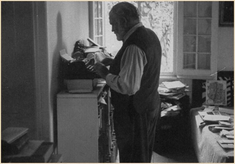 Ernest Hemingway at his desk